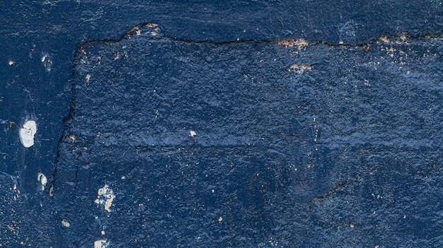 Detail of a portion of the wall painted in blue.