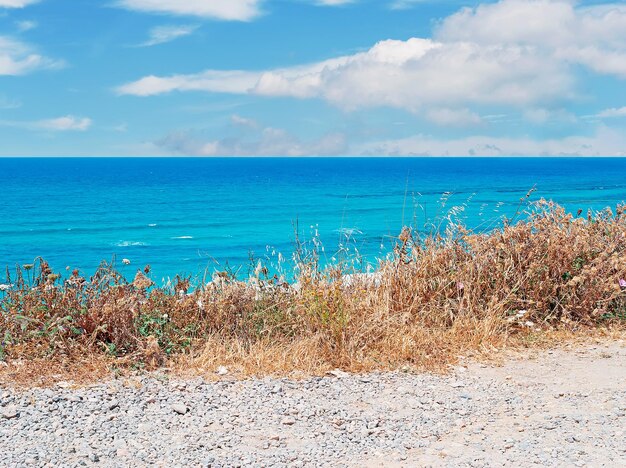 Detail of Sardinia coastline on a cloudy day