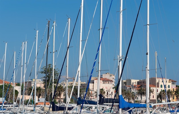 Detail of several boat masts in Alghero Sardinia