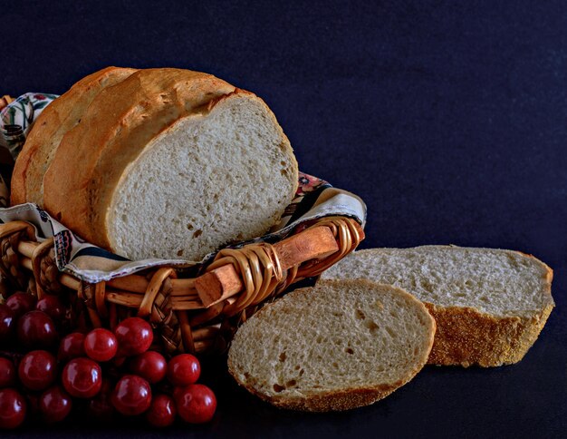 Photo detail shot of bread over black background