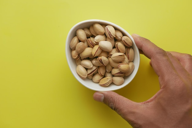 Foto immagine dettagliata di pistacchi in una ciotola