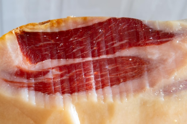 Photo detail of sliced iberian spanish bellota ham