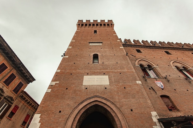 Detail of Tower of the town hall building in Ferrara in Italy