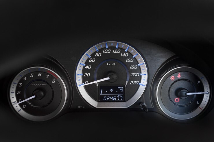 Photo detail with the gauges on the dashboard of a car