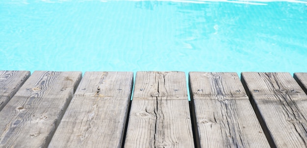 Detailed view of a wooden floor and pool