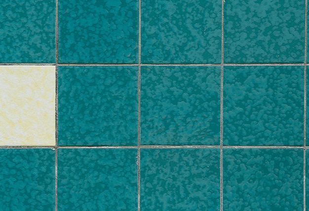Detailfoto van de betegelde muur