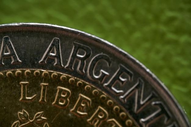 Details of an Argentine coin where it says Argentine Republic and freedom