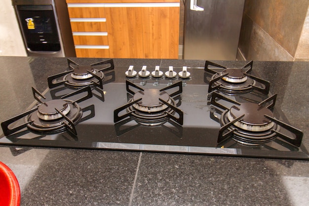 Details of a cooktop stove in a kitchen in rio de janeiro.