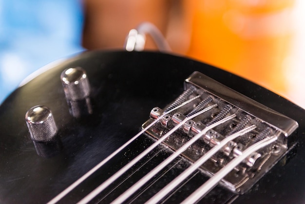 Details of a five string electric bass