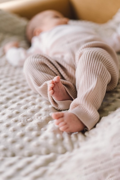 Details of the foot of a one month old baby female Photo depicts details of the newborn's feet and toes