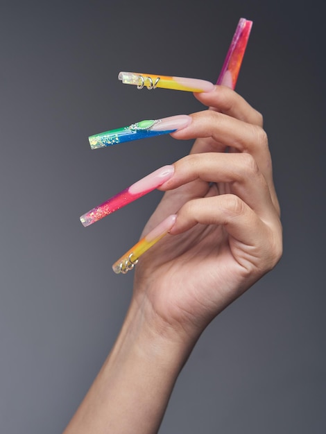 Details of gel nails on a black background