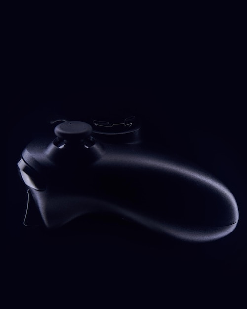 Details of a joystick on a black background