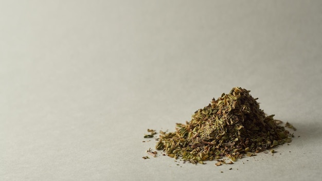 Details of a mountain of oregano on a white background