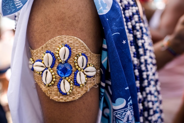 Photo details and props of the clothes of the traditional carnival group filhos de gandy that parade