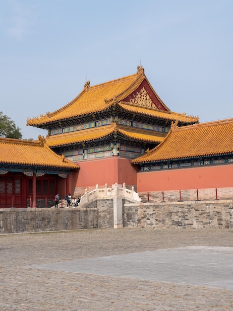 Details van dak en houtsnijwerk in Verboden Stad in Peking