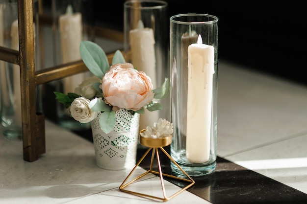 Photo details wedding decor on a gray textural background a bouquet of dried flowers tulips and white