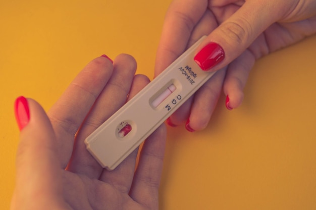 Details with a health official taking a fast Covid19 Antibody Test past infection