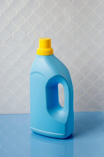 Detergent for children's clothes in a blue bottle in the bathroom. Design mockup blank bottles packaging.