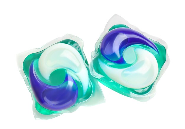 Detergent pods on white background Laundry day