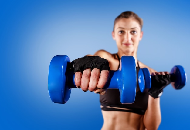 Determinated sexy girl at the gym ready to start fitness lesson