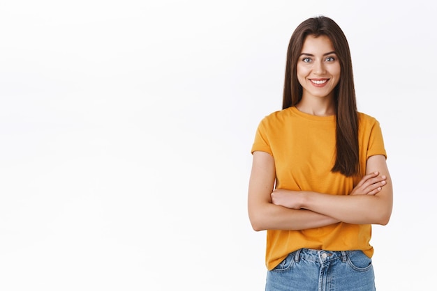 Determined goodlooking young woman prepare halloween party cross hands over chest with confident satisfied expression as enjoying thought how good party be standing white background