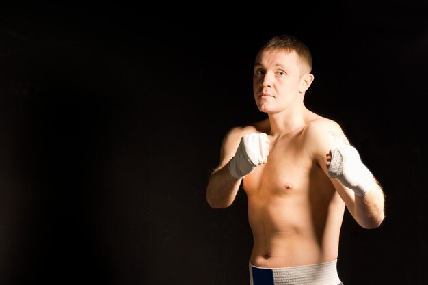 Photo determined intense young boxer