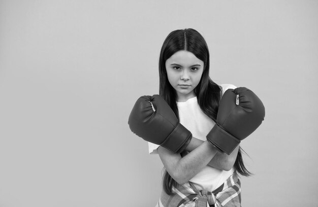 Determined successful kid boxer fight for success confident child ready for competition