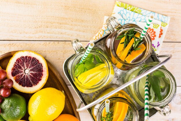 Detox citrus infused water as a refreshing summer drink.