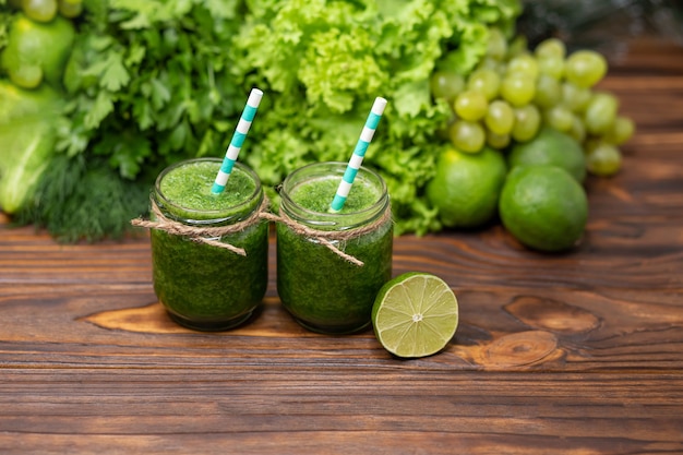 Detox diet concept healthy green smoothie with spinach in a jar