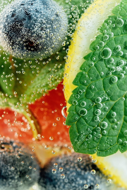 Detox refreshing sassy water with cucumber ginger mint and lemon in glasses