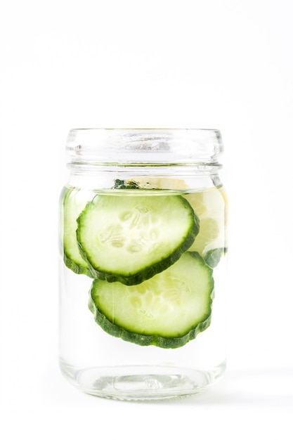 Detox water with cucumber and lemon isolated on white