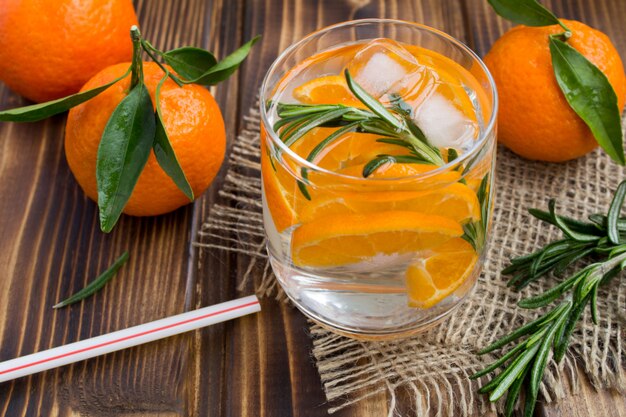 Detox water with mandarins and rosemary