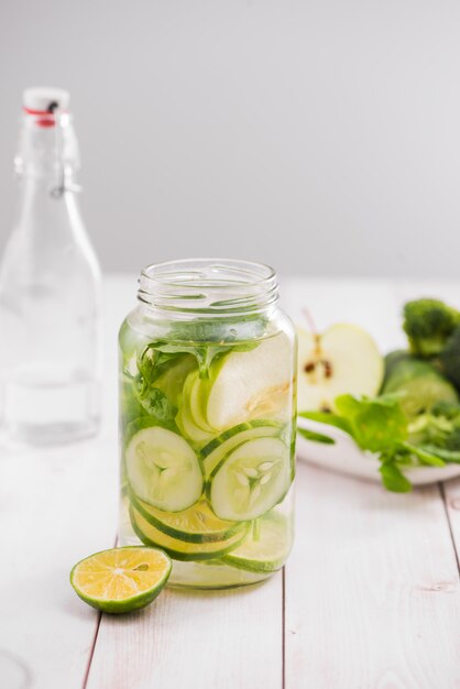 Detox water with vegetables and fruits. Diet healthy eating and weight loss.