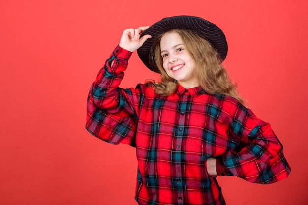 Develop talent into career Girl artistic kid practicing acting skills with black hat Enter acting academy Acting school for children Acting lessons guide children through wide variety of genres