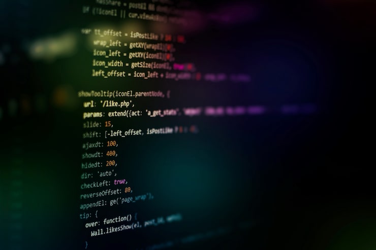 Photo developer programming code. abstract computer script code. programming code screen of software developer. software programming work time.