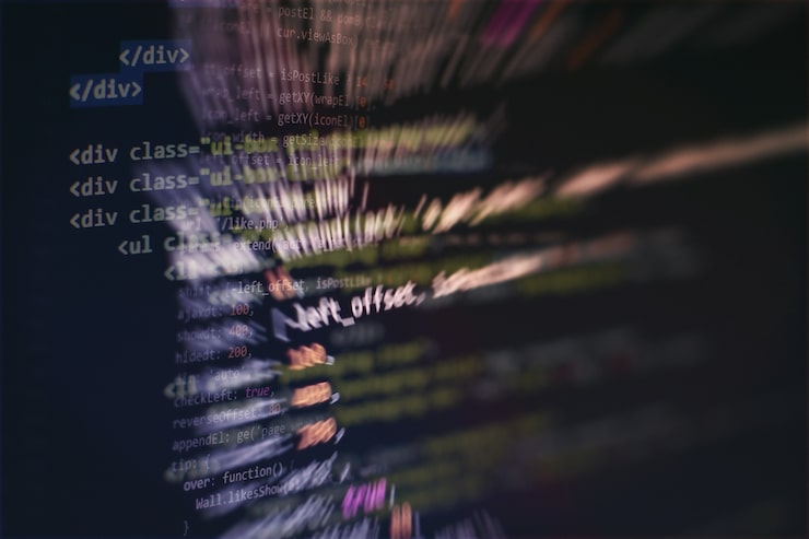 Photo developer programming code. abstract computer script code. programming code screen of software developer. software programming work time.