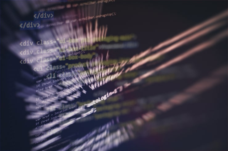 Photo developer programming code. abstract computer script code. programming code screen of software developer. software programming work time.