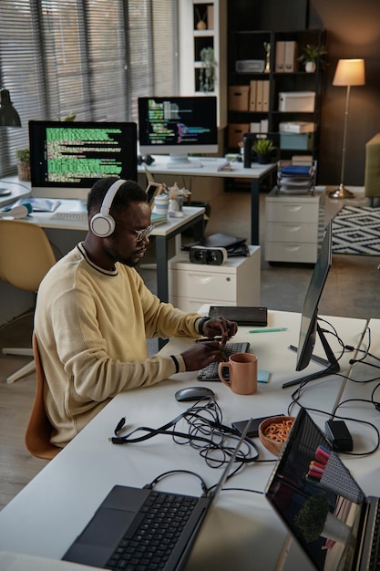 Developer reviewing programming code