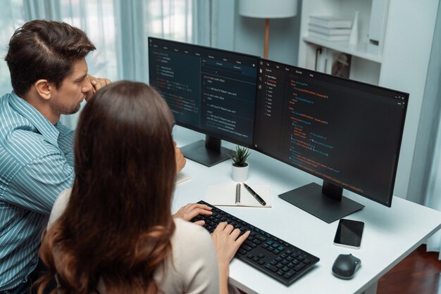 Developers program coding discussing website planning software postulate