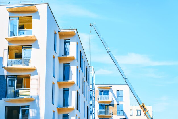 Development of modern residential building with the lifting crane