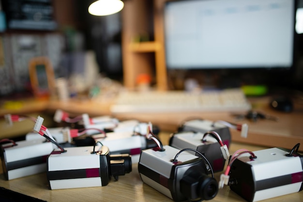 Device plastic cases with cables for TFT monitors on table