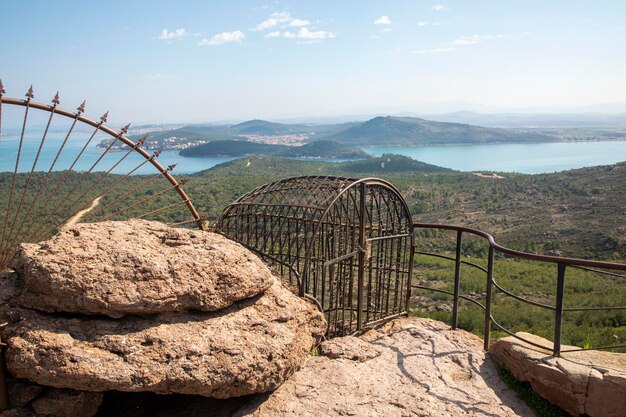 Devil's Table know as Seytan Sofrasi , Ayvalik. Place devil's footprint, It's believed, if you tie a ribbon with wish to iron fence, it will come true