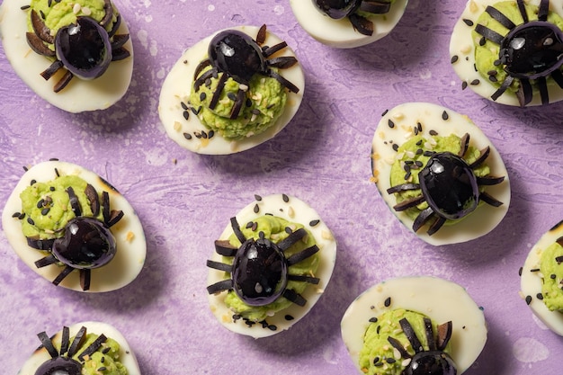 Deviled eggs with a spider for halloween