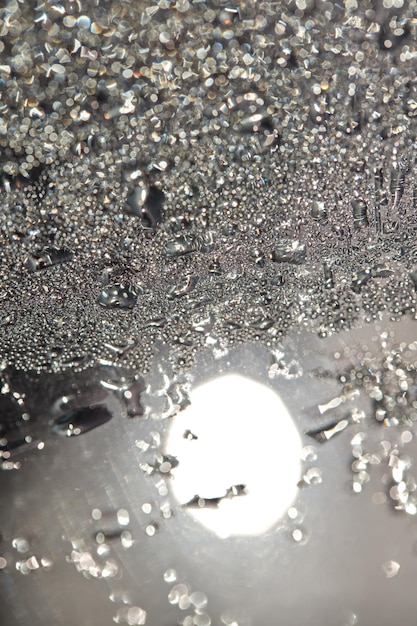 Photo dewdrops on glas