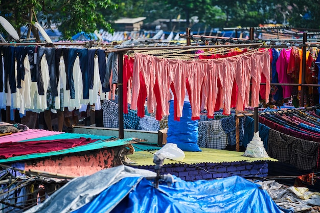 Dhobi Ghat is an open air laundromat lavoir in Mumbai, India with laundry drying on ropes