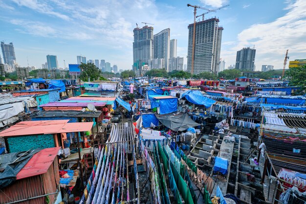 Dhobi Ghat is an open air laundromat lavoir in Mumbai, India with laundry drying on ropes