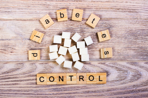 Diabetes control block wooden letters with refined sugar