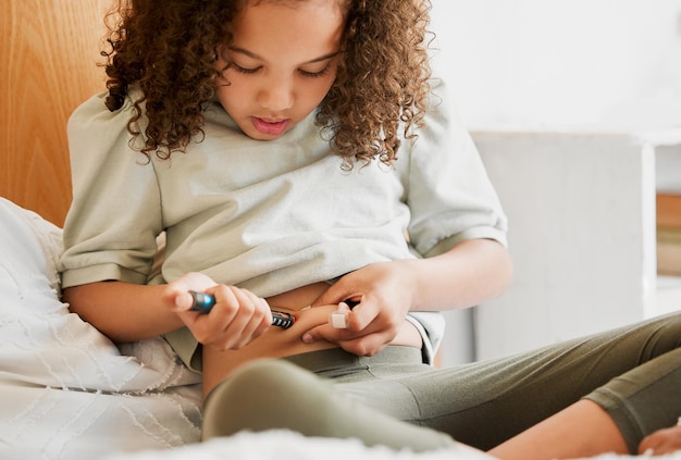 Diabetes insulin and diabetic girl injecting treatment in her bedroom as a health morning routine at home Medicine house and testing to monitor blood sugar levels wellness and medical healthcare