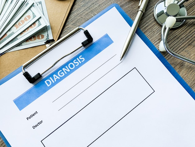 Diagnosis form with the patient's data on the doctors desk.