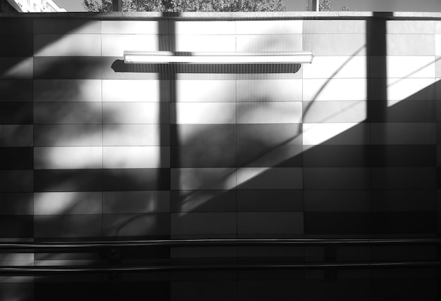 Diagonal black and white light on street wall background